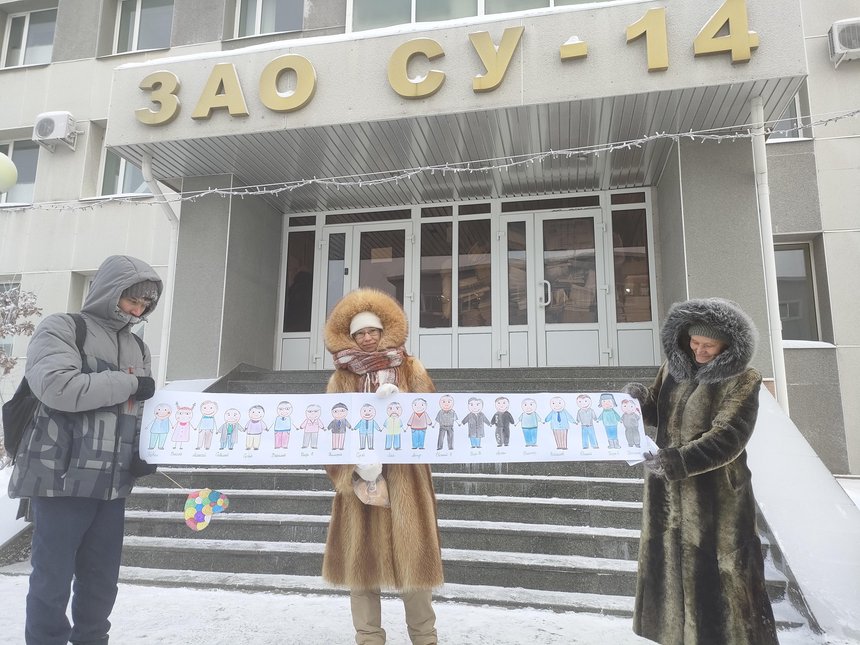Friends who came to support believers in minus 30-degree frost
