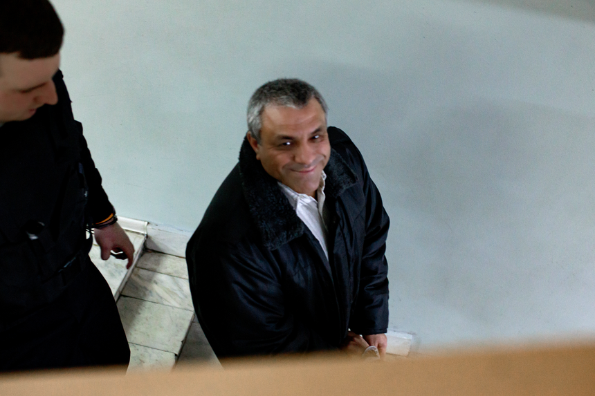 Anatoly Yevtushenko watches his friends and family as bailiffs lead him away in handcuffs from the courtroom. December 2025.